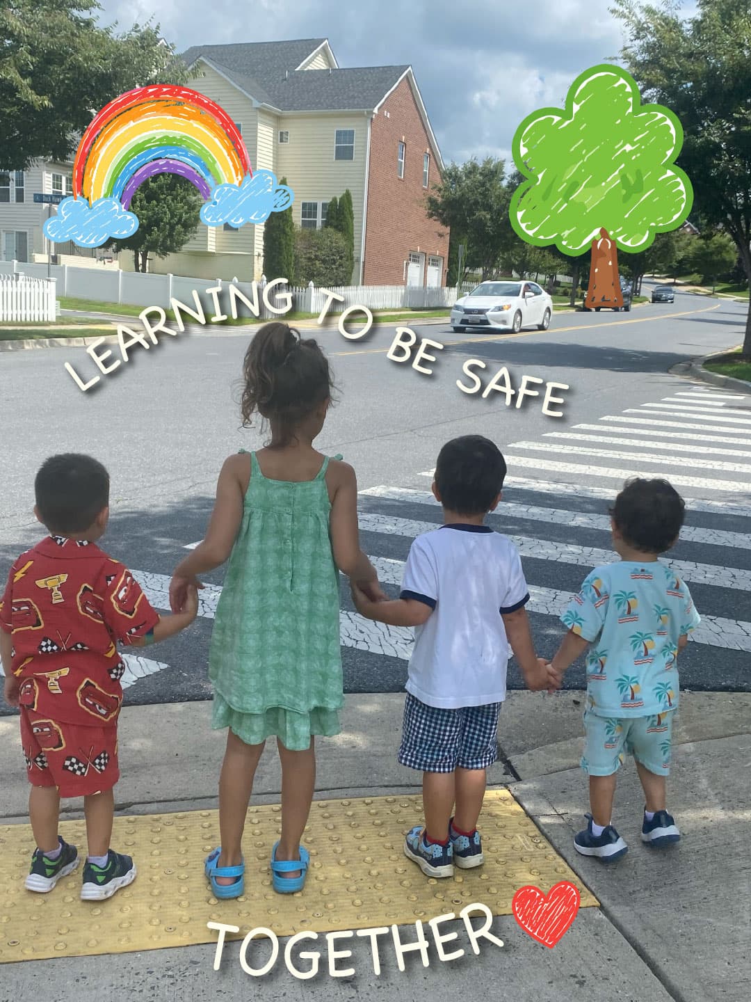 daycare kids practicing holding hands before crossing the street. 